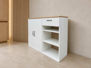 2-door, 1-drawer cabinet; white body with wood-grain top.