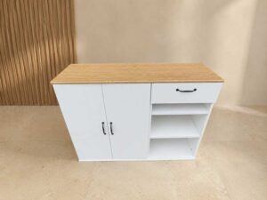 2-door, 1-drawer cabinet; white body with wood-grain top.