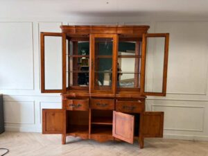 Wooden display cabinet with three glass doors, three drawers, and three small compartments; features two separable sections and internal lighting (1)