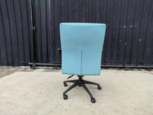 Logica office chair, black seat, blue backrest.