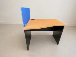 Contoured desk with black wooden legs (available in single-station or double-station configurations) + blue partition.