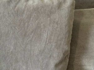 Brown 2-seater sofa with 5 cushions
