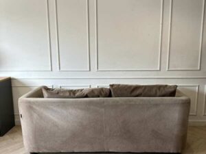 Brown 2-seater sofa with 5 cushions