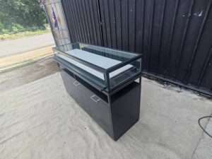 Glass display case, jewelry case with 3 doors and 3 shelves.