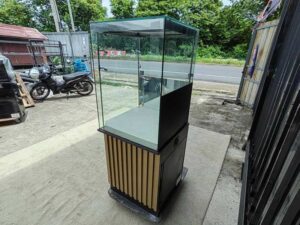 Tall square display cabinet with one storage compartment