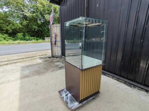 Tall square display cabinet with one storage compartment