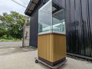 Tall square display cabinet with one storage compartment