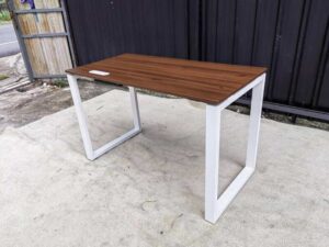 Brown desk with metal legs