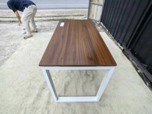 Brown desk with metal legs