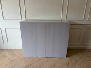 Two-door teak sideboard, gray color, wood grain top.