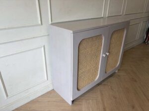 Two-door teak sideboard, gray color, wood grain top.