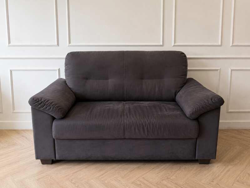 IKEA 2-seater sofa, dark grey fabric upholstery, modern style.