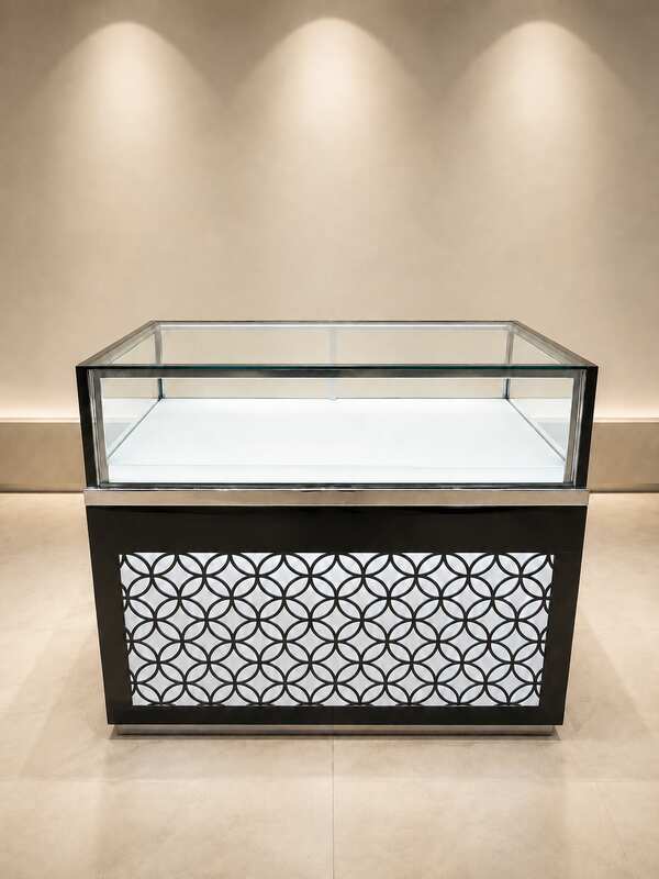 Black glass display cabinet featuring one hinged door, two drawers, and one sliding-door storage compartment.