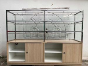 Glass shelving unit and sliding-door storage compartment. (1)