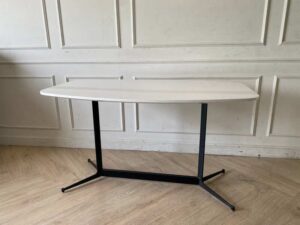 Dining table with wooden top and stainless steel legs. (1)