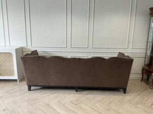 Brown 3-seater sofa with stud detailing along the edges (1)