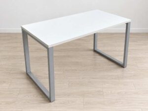 Minimalist office desk with steel legs and white top