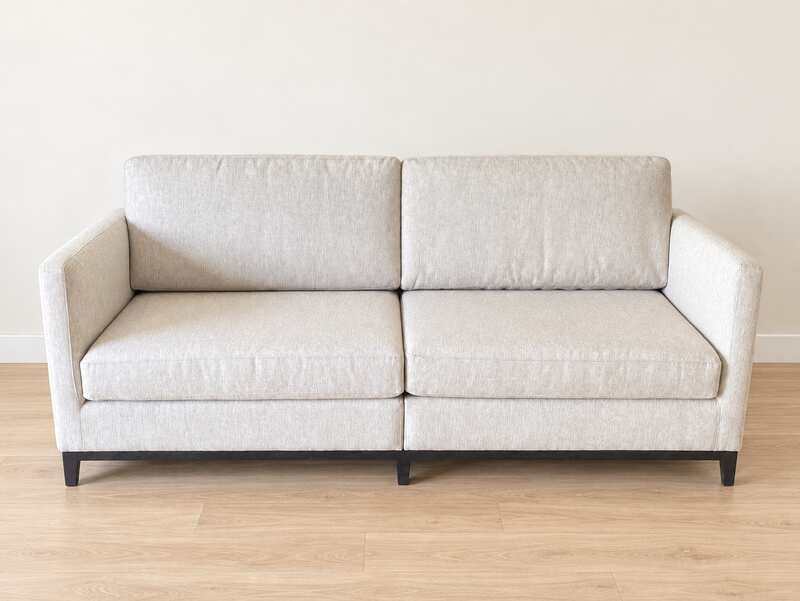 Modern style sofa with light gray fabric upholstery. (1)