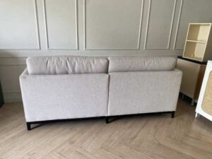 Modern style sofa with light gray fabric upholstery. (1)