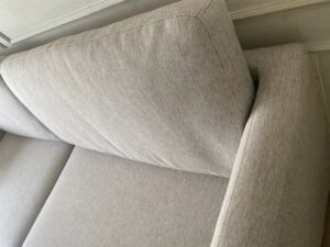 Modern style sofa with light gray fabric upholstery. (1)