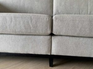Modern style sofa with light gray fabric upholstery. (1)